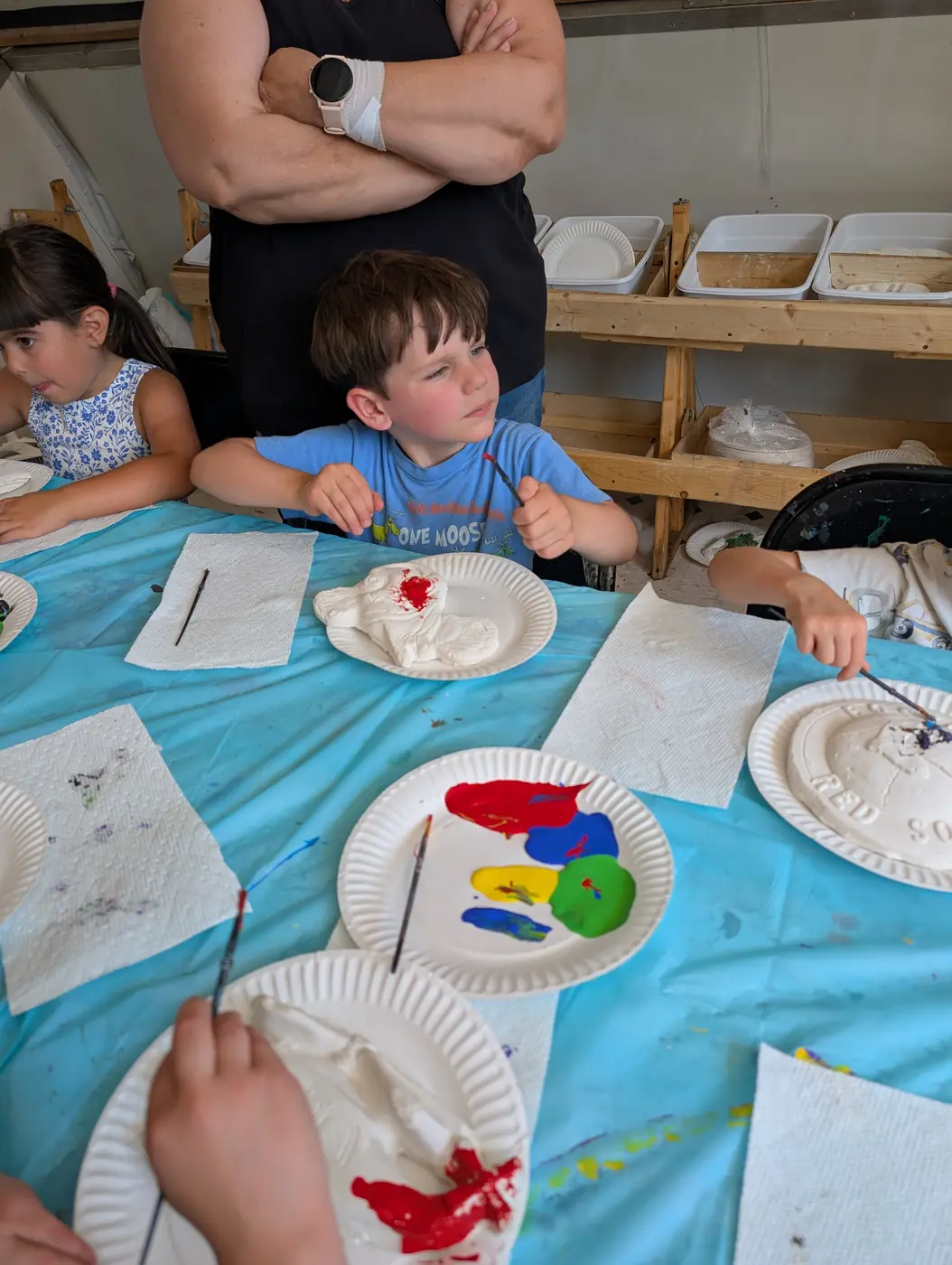 Children creating and decorating together at Blossom Station in Acton, MA
